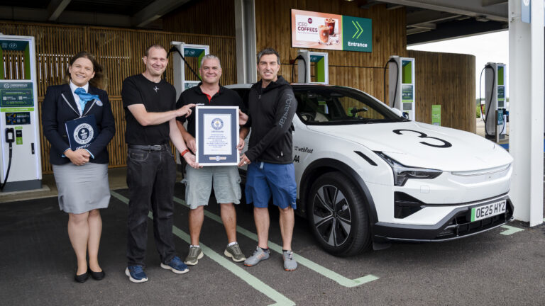 Efficiency drivers Sam Clarke, Kevin Booker, and Richard Parker, along with Guinness World Records judge Paulina Sapinska, pictured beside the Polestar 3