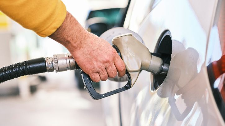 BASF’s latest gasoline performance additive series certified against new US standard A person adding fuel to their car.