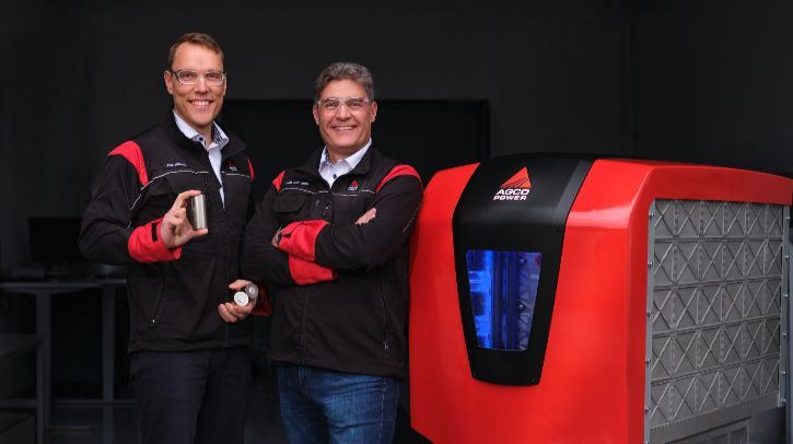 Agco Power to present Future Battery Concept for off-road machinery Juha Heikkilä (left), manager electrification, holds NMC battery cells used in the prototype battery, while Kari Aaltonen, director engineering, stands beside the concept unit