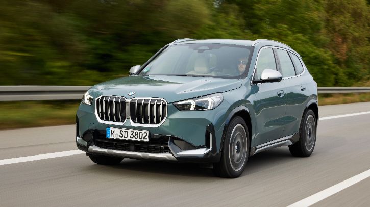 BMW X1 sDrive 18 driving on a road.