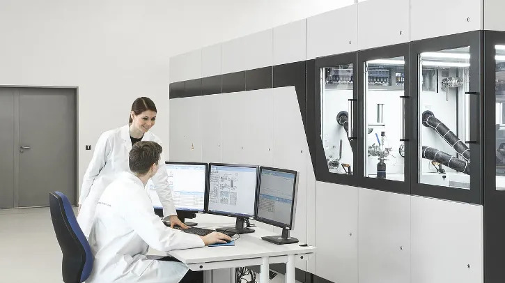 Lab technicians talking.