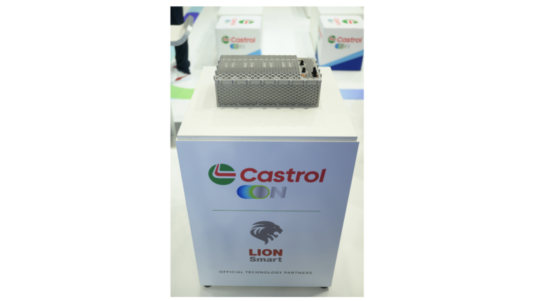 Castrol and Lion Smart collaborate on EV battery cooling A platform with the Castrol and Lion Smart company logos on, demonstrating the new cutting-edge battery module that their collaboration will facilitate