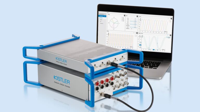 The Kistler KiBox2 powertrain analysis system shown in profile against a blue and grey background, plugged into a laptop