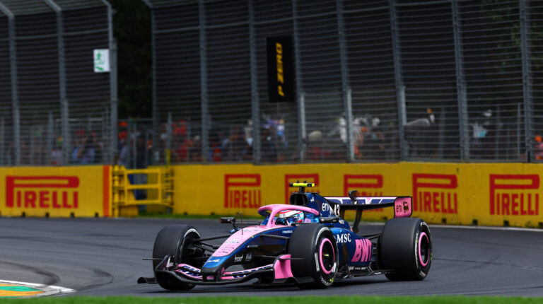 BWT Alpine Formula One Team car takes a turn at the F1 race track in Melbourne, Australia.