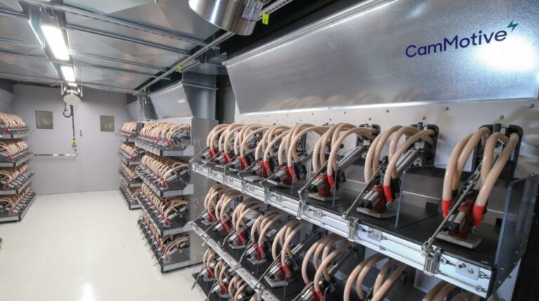 CamMotive opens high-current battery testing facility in Cambridge The inside of the new CamMotive battery testing lab in Cambridge. There are silver metal walls and a long line of grey and red cables.