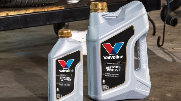 Valvoline launches Restore & Protect lubricant in Europe Two plastic cans of Valvoline's Restore & Protect lubricant on a concrete outdoor floor.