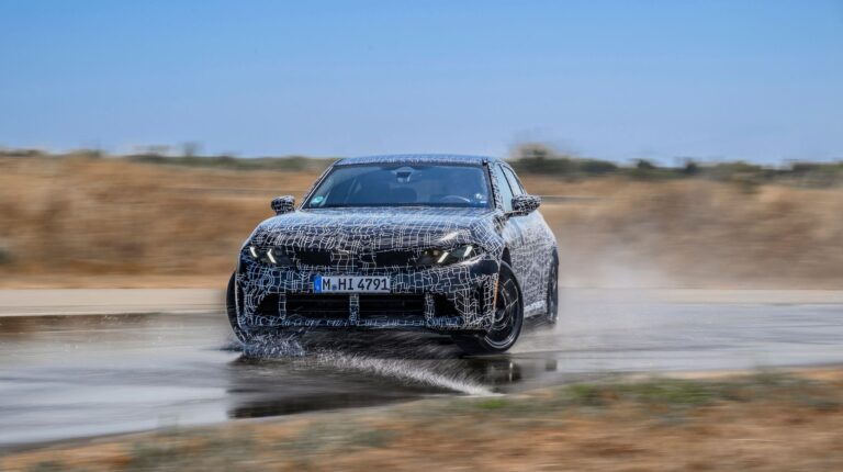 BMW puts new 48V mild-hybrid 3 Series through final summer driving dynamics testing A camouflaged BMW 3 Series goes through testing in southern France, skidding through a high speed turn.
